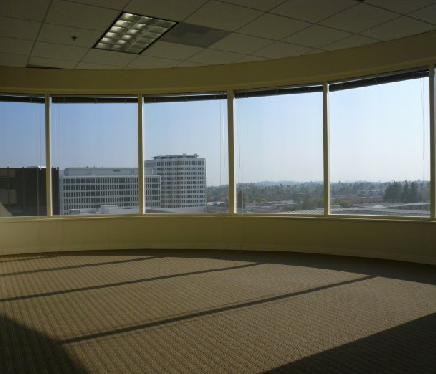 Frosted decorative window film applied to a conference room partition.