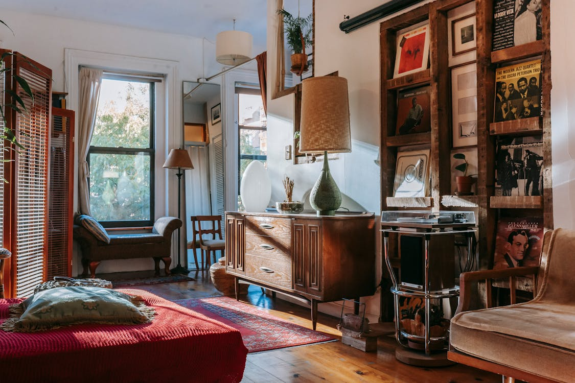 Sunlight coming through a window and damaging furniture, vinyls, and luxury pieces.