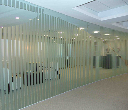 Frosted white glass panels used in an office interior to create privacy and a sleek modern look