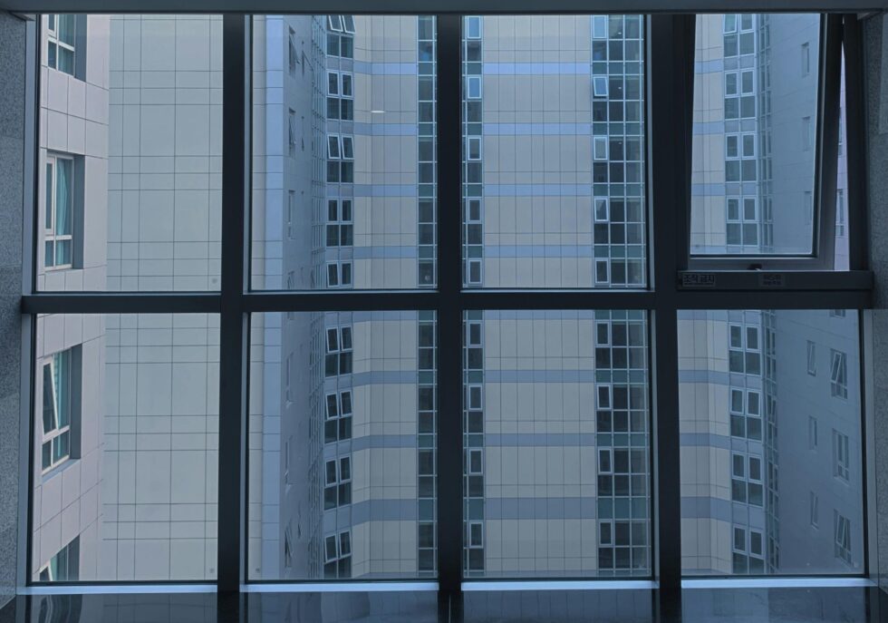 high rise window tint large glass panels building interior